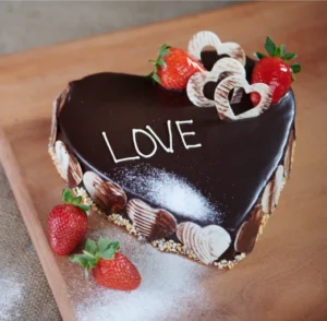 heart-shaped-chocolate-cake,-fresh-strawberries,-and-red-wine