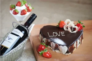 photography-by-galadari-showcasing-a-heart-shaped-chocolate-cake,-fresh-strawberries,-and-red-wine